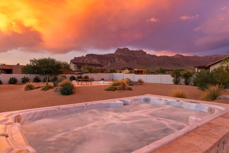 The hot tub at twilight facing the mountain